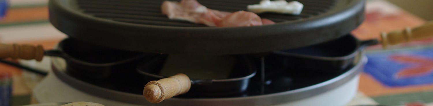 Två värmekällor på raclettegrill